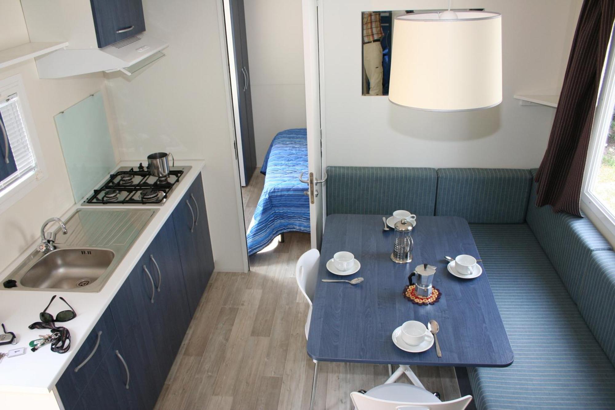 Happy Camp Mobile Homes In Village Baia Paradiso Camping